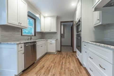 Davis kitchen with new white cabinets and quartzite countertop