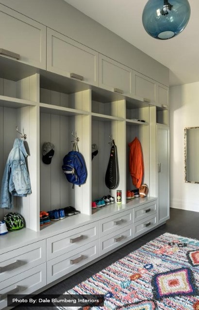 Mudroom with drawers and individual spaces for clothing